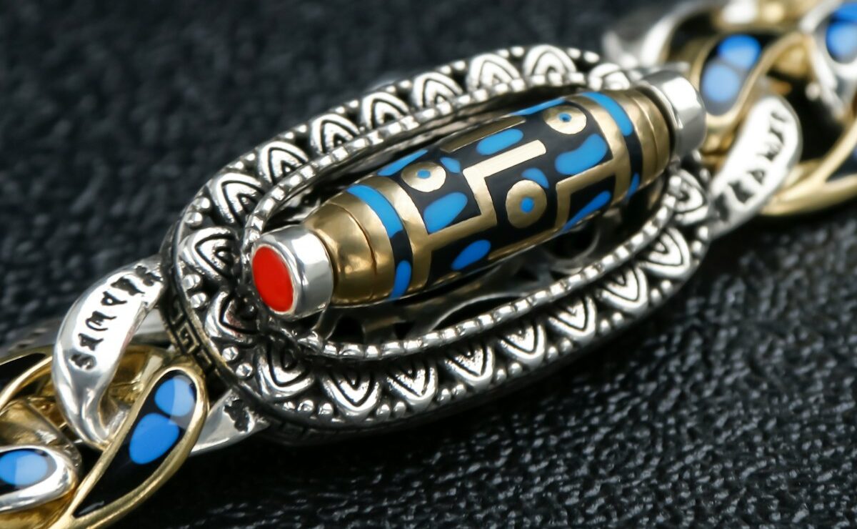 Jeweled bracelet with a striking tibetan bead.