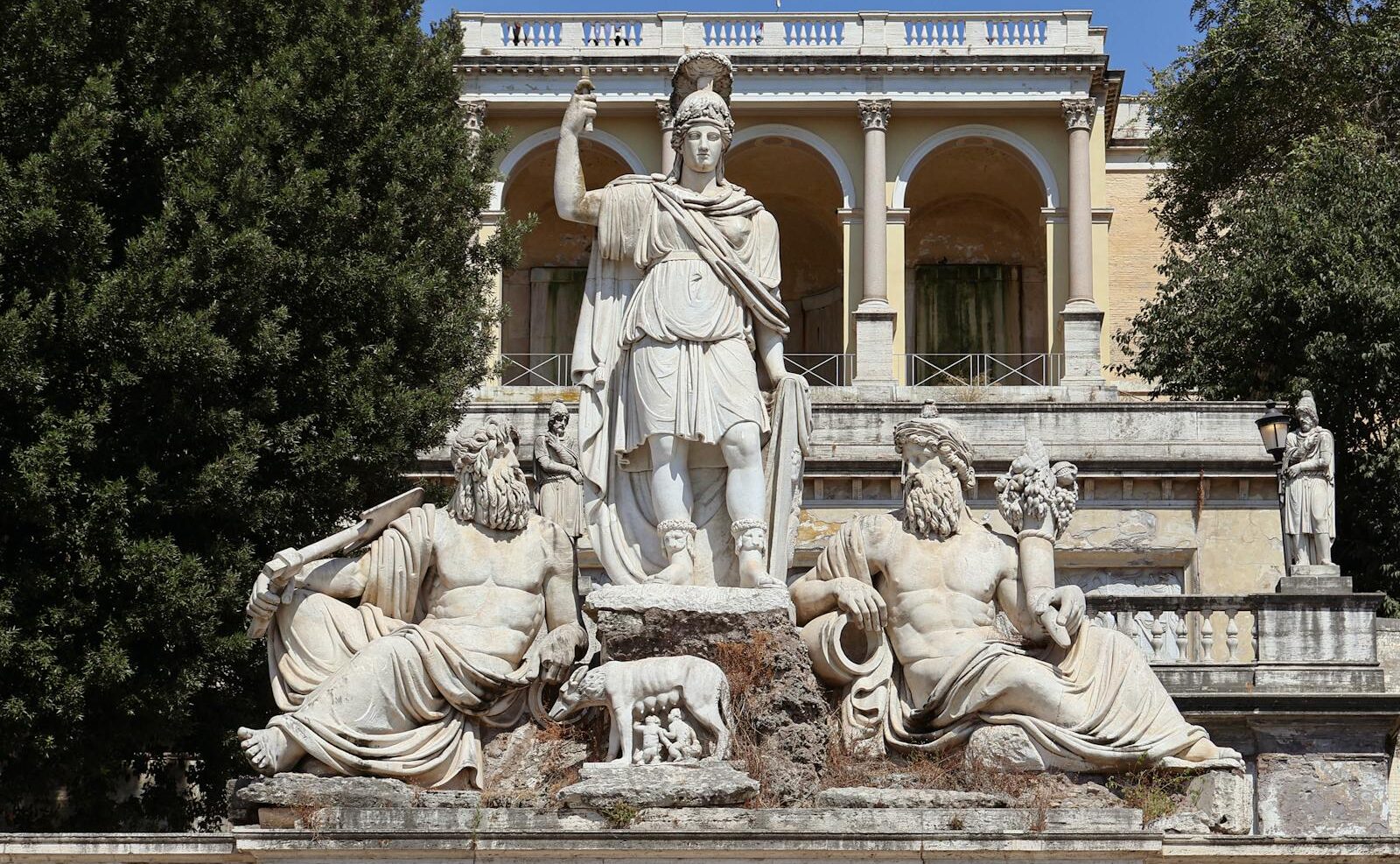 Majestic statues at the Fountain of the Goddess Roma in Rome, showcasing ancient Roman artistry.